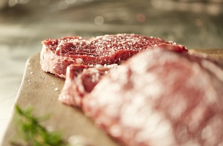 image of raw steaks