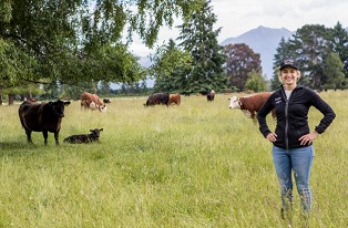 image of Gemma Jenkins with cattle