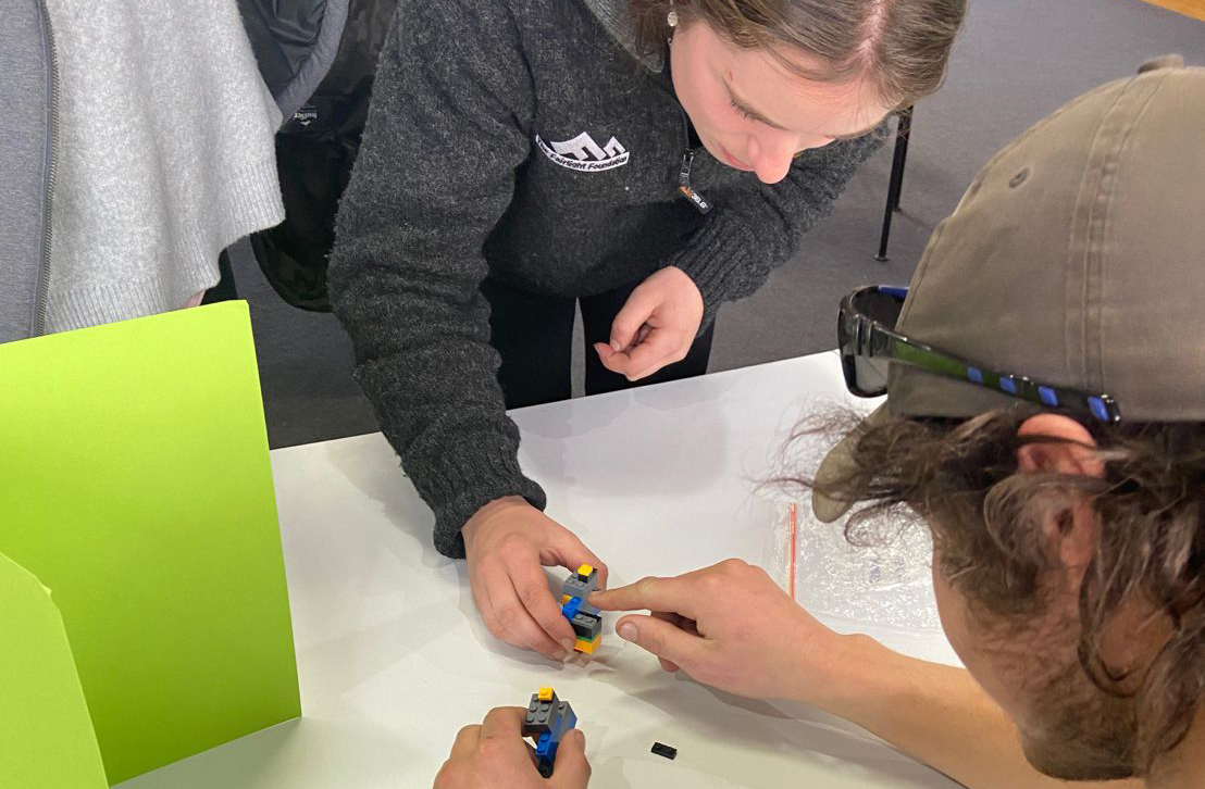 image of two students playing with lego