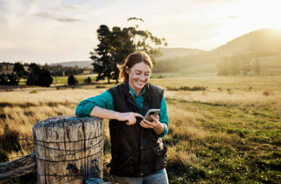 image of farmer using phone