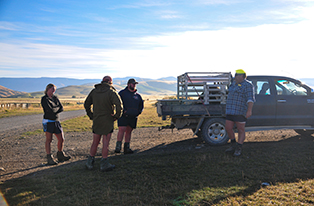 image of farmer by ute and three cadets