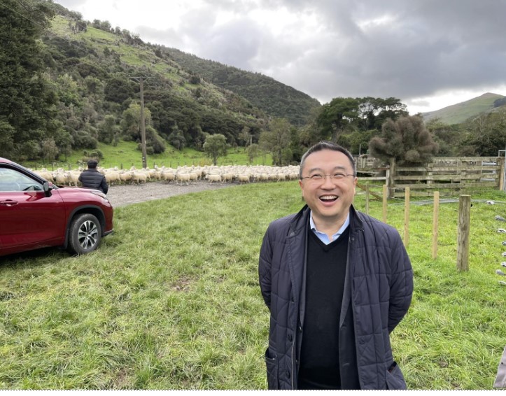 image of Chinese visitor on-farm