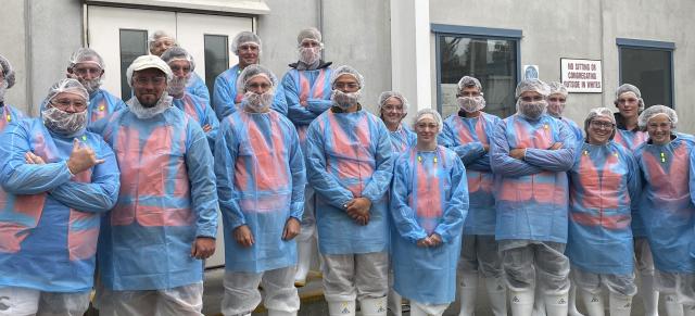 image of Gen Next graduates entering meat processing facility