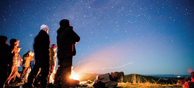 image of farming looking at stars in sky