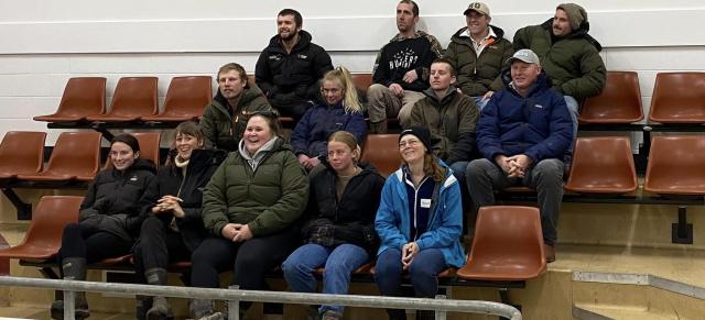 image of farmers sitting in stadium