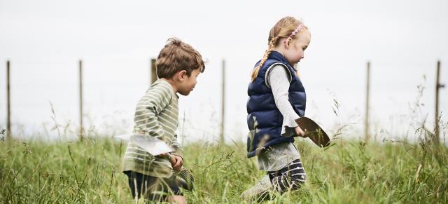 image of boy and girl in field