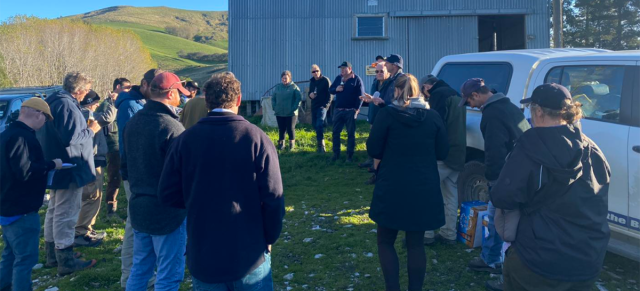 image of field day attendees outside shed