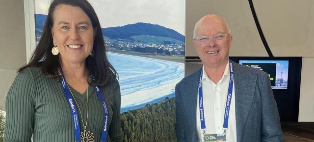 image of presenters at conference