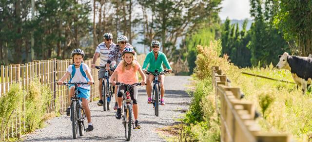 image of family cycling on new coastal cycle trail