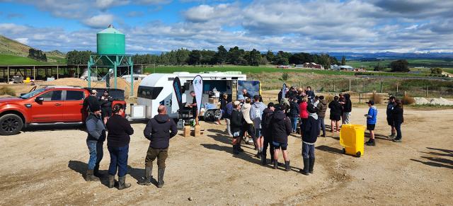 image of people having lunch stop on farm