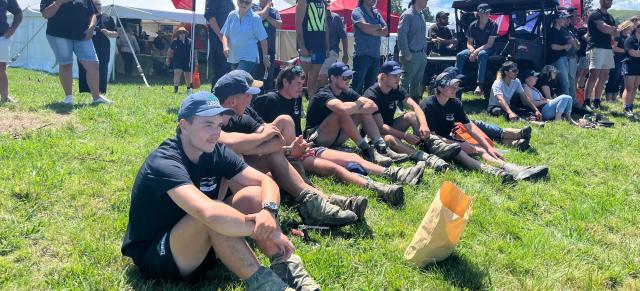image of students sitting on bank at field days