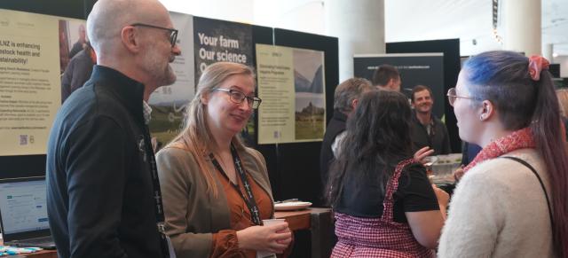 Beef + Lamb New Zealand staff talking to conference attendee