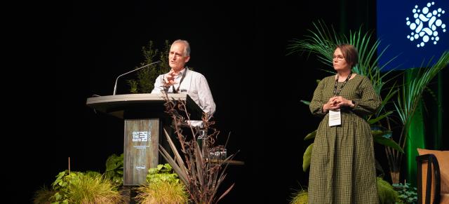 Image of two speakers at Out the Gate