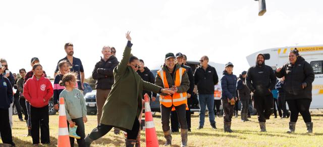 image of field day in Gisborne woman throwing gumboot