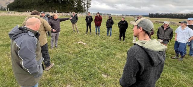 image of farmers at field day in paddock