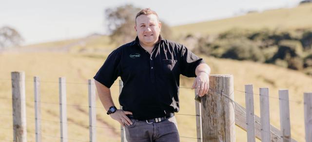 Image of Charles on farm in B+LNZ branded shirt