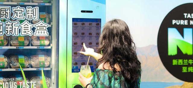 image of woman at vending machine