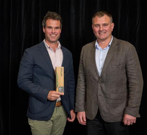 Image of Lonestar Nelson accepting award