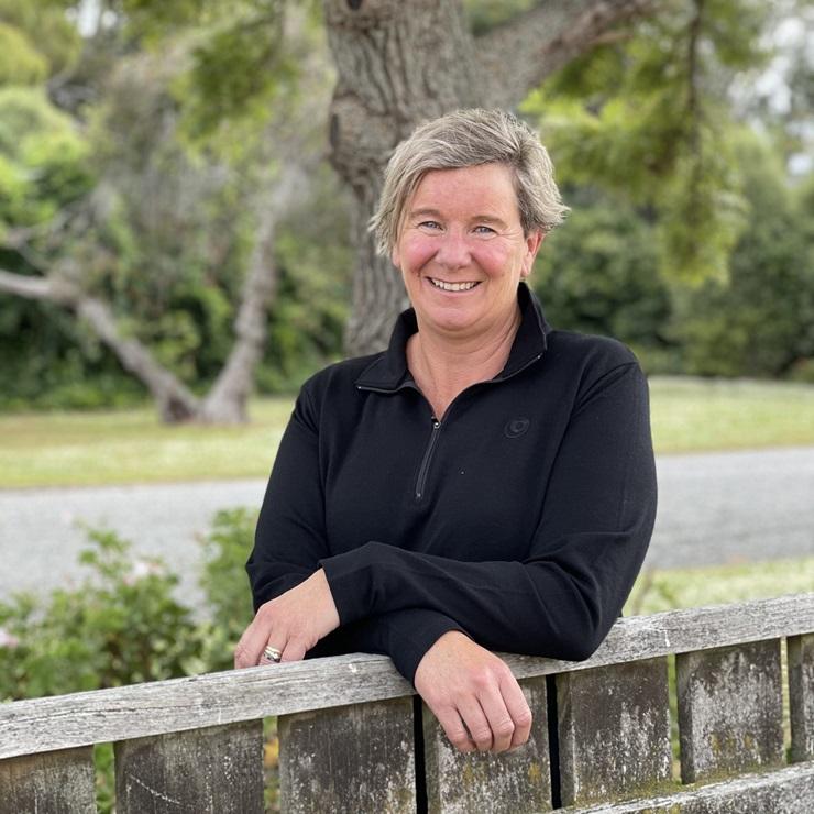 image of Angela McFetridge outside by fence