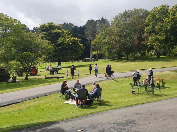 image of people eating in the park