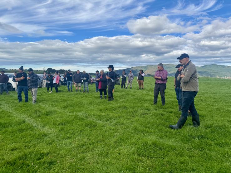 image of field day attendees observing farm