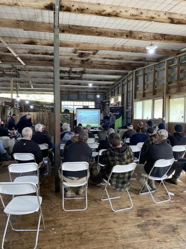 image of attendees inside wool shed