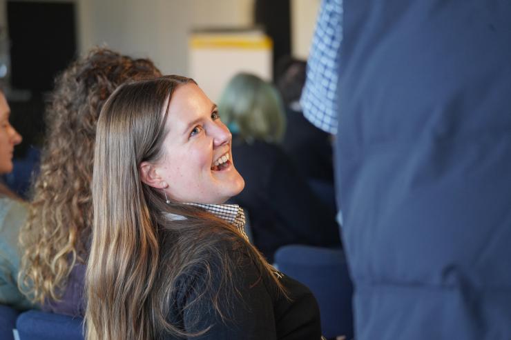 Lady laughing in audience