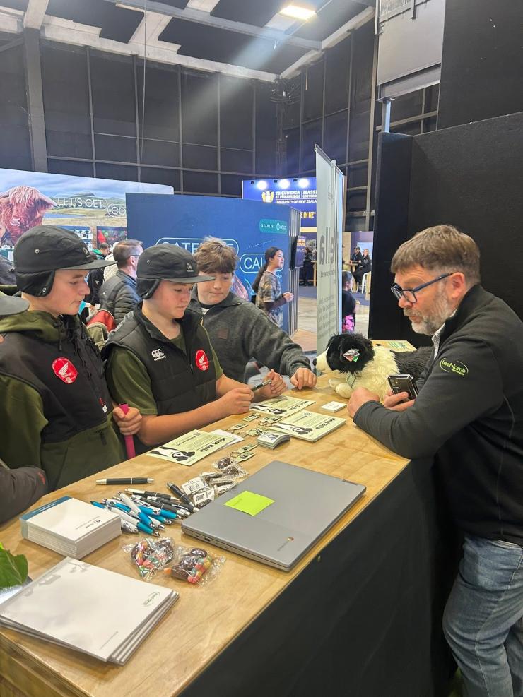 Aaron Meikle talking to students at Fieldays