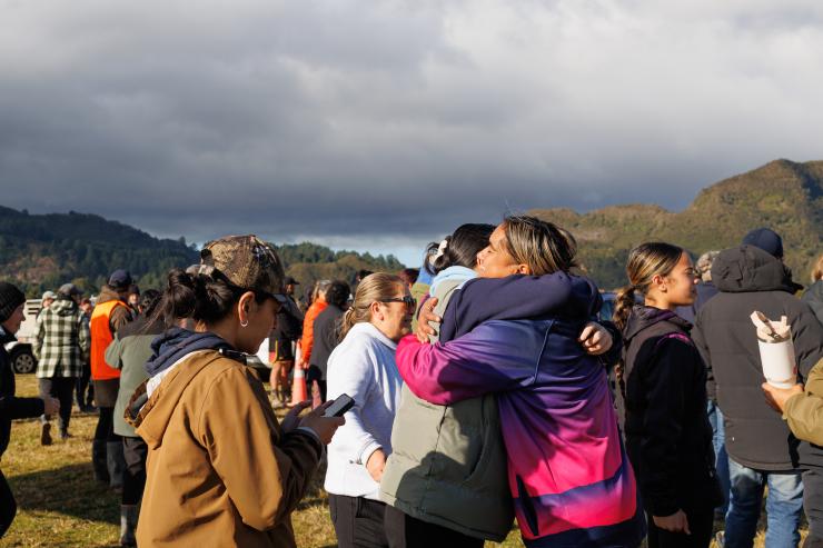 image of women hugging at field day