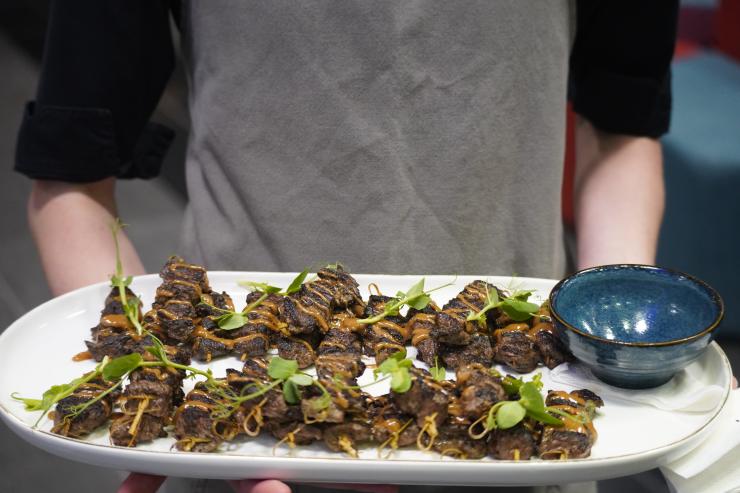 image of red meat served at event