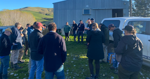 image of field day attendees outside shed