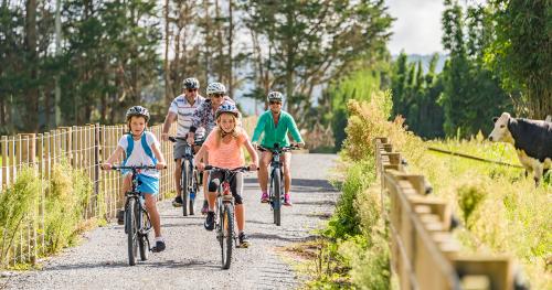 image of family cycling on new coastal cycle trail