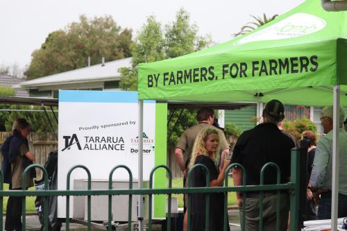 image of B+LNZ branded tent outside with particpants