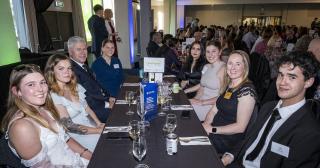 image of blnz staff and university students at dinner 