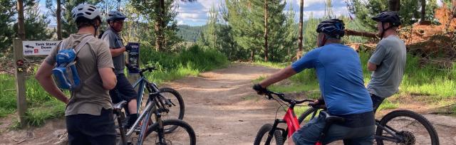 image of people riding bikes
