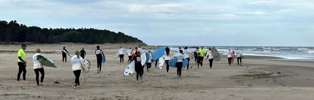 image of farmers surfing at Wairarapa beach