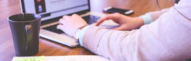 image of woman at computer