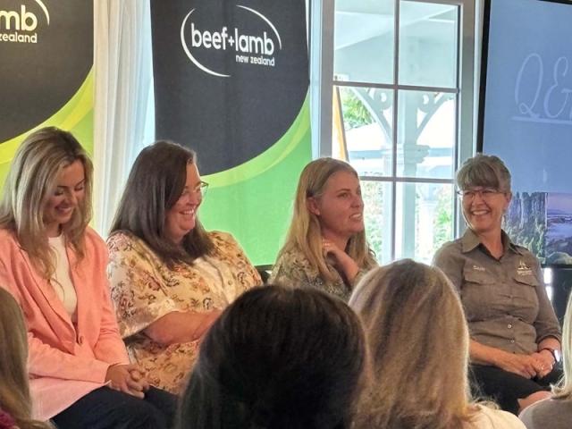 image of four women panel sitting on stage