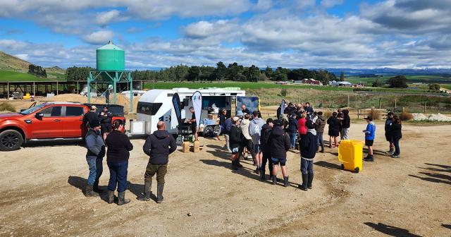 image of people having lunch stop on farm