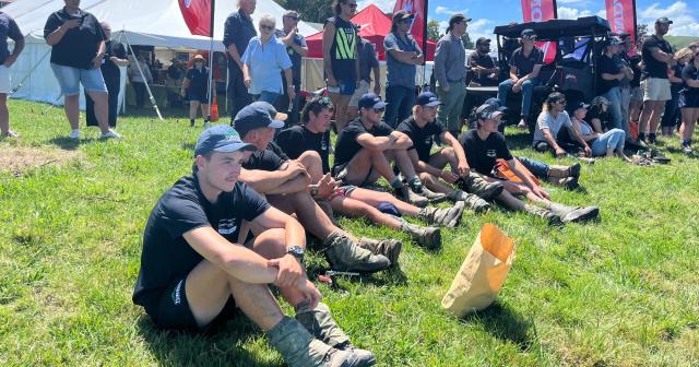 image of students sitting on bank at field days