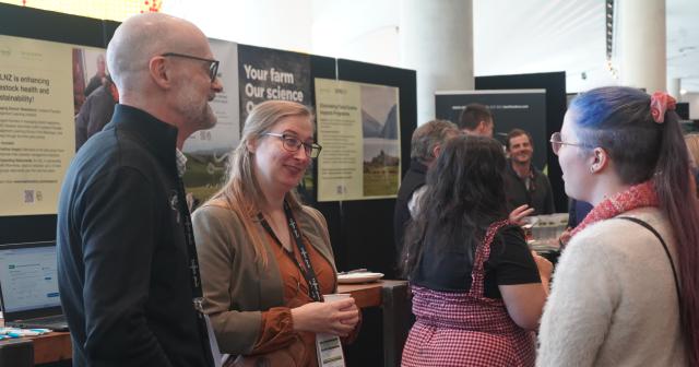 Beef + Lamb New Zealand staff talking to conference attendee