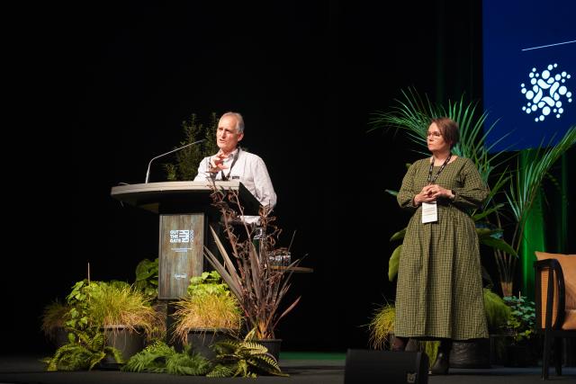 Image of two speakers at Out the Gate