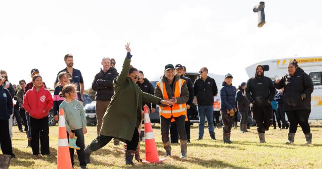 image of field day in Gisborne woman throwing gumboot