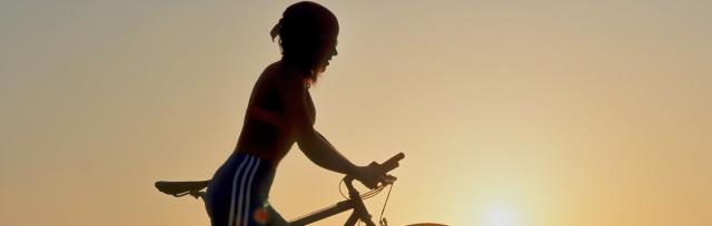 Image of female cyclist Image of female cyclist
