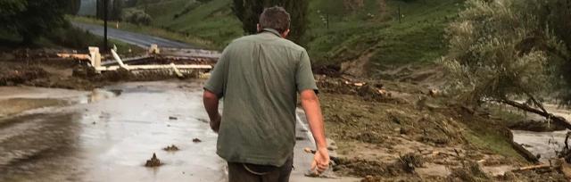image of farmer in flood affected area