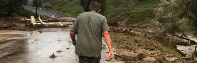 flooding image of farmer in flood affected area