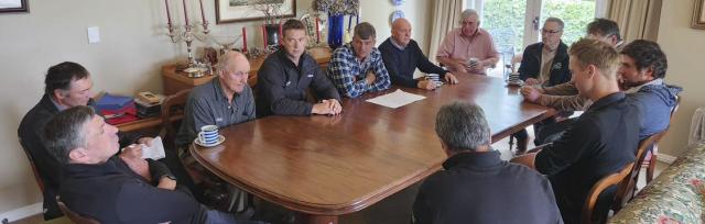 farmers farmers talking around a table